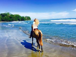 riding on the beach and into the jungel